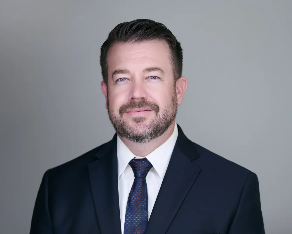 Young actor Trevor with genuine smile in commercial headshot